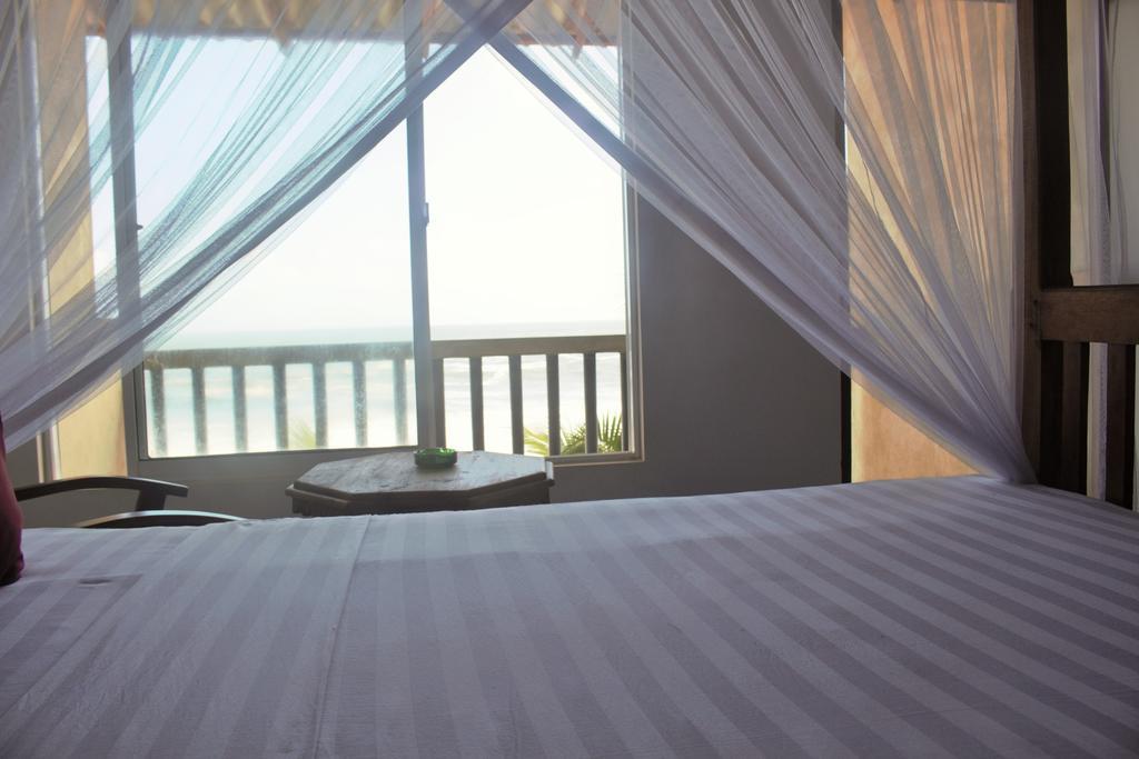 Quarto Duplo com Varanda e Vista do Mar